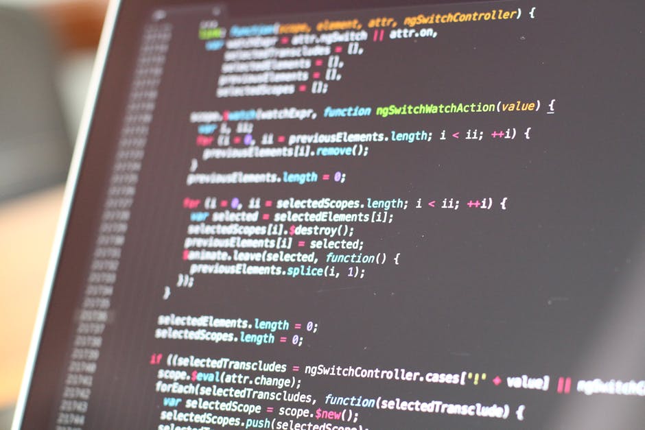 A close-up view of a computer screen displaying lines of colorful programming code on a dark background. The code includes syntax highlighting with keywords in blue, variables in white, and functions 